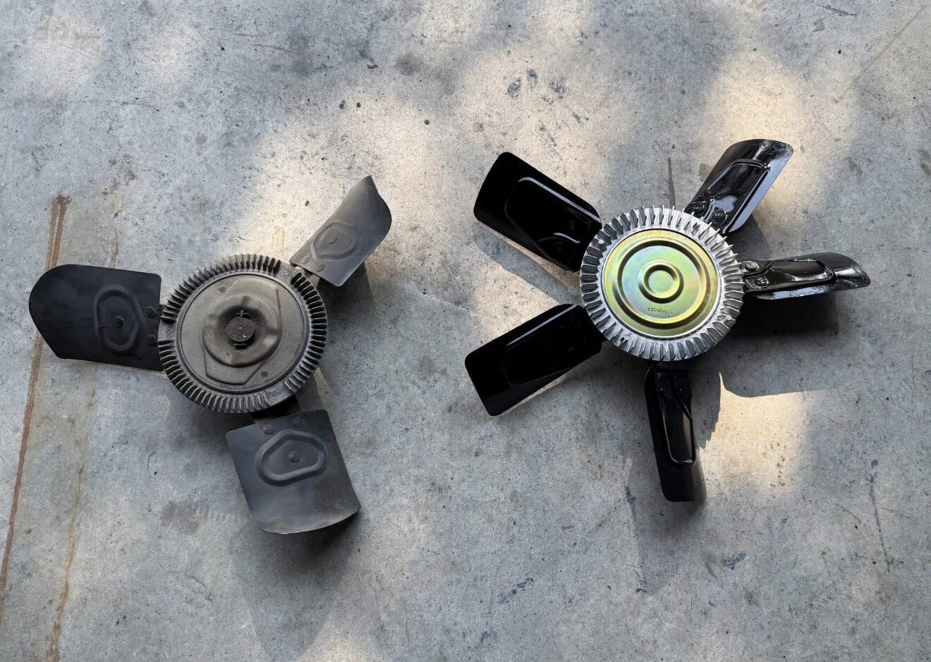 Old three-blade fan beside the refurbished five-blade — tap to enlarge