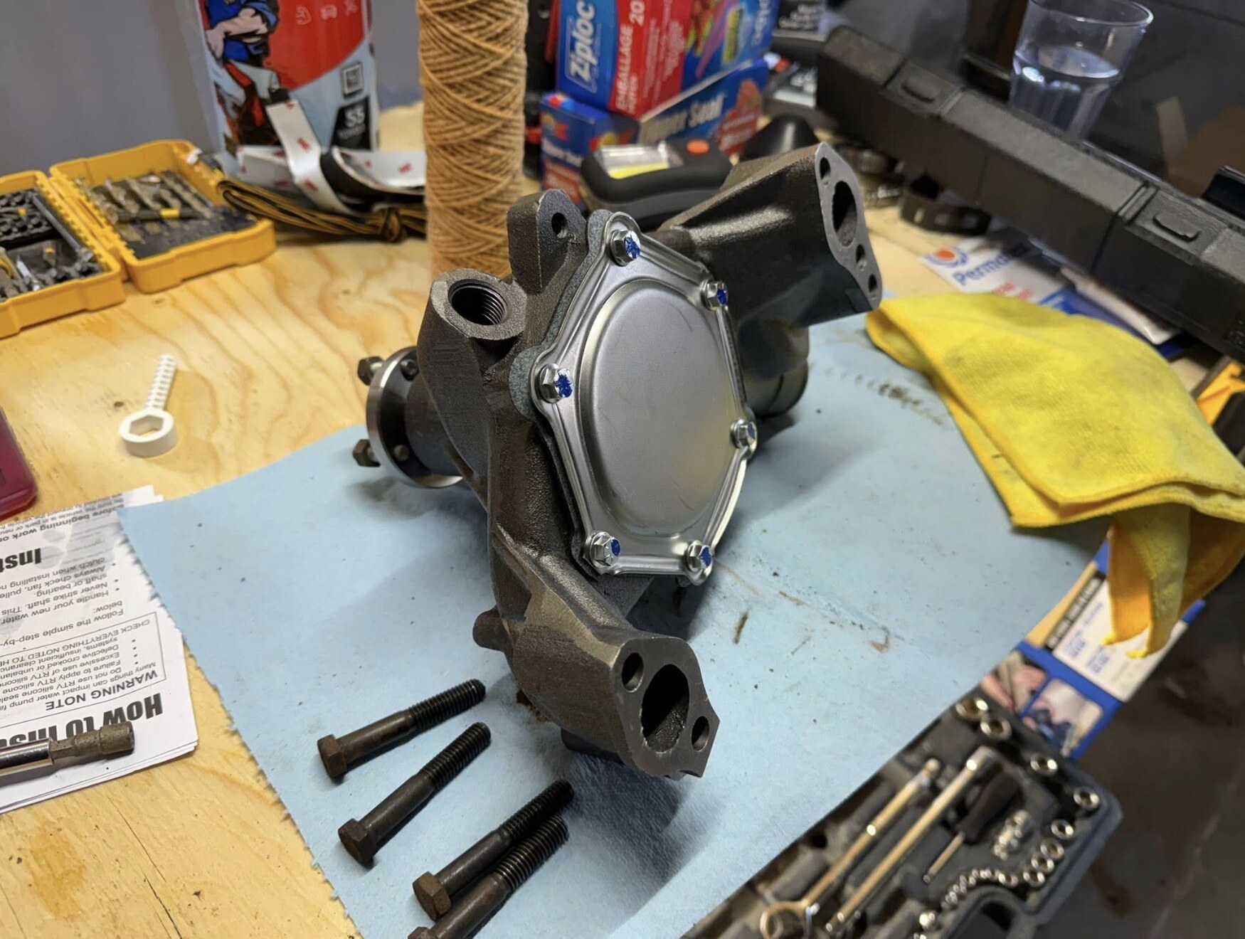 New water pump on the workbench — tap to enlarge