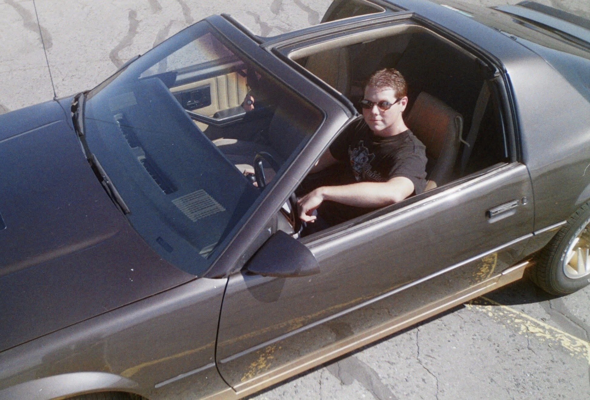 Meathead in the old Camaro with T-tops off — tap to enlarge